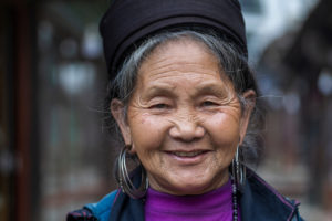 A Vietnamese woman on the street showcasing the idea of Vietnames caregiving